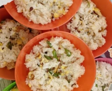 Home-cooked fried rice with vegetables and egg